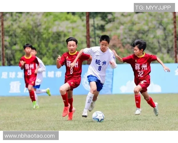 杭州足球队以66分稳居总决赛积分榜首位争夺冠军形势明朗